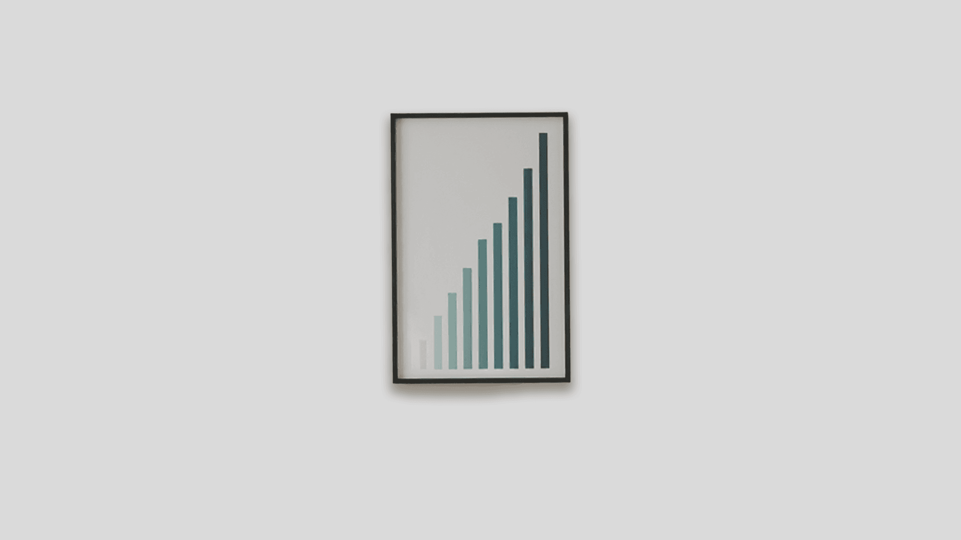 a frame with a grouth chart on a wall